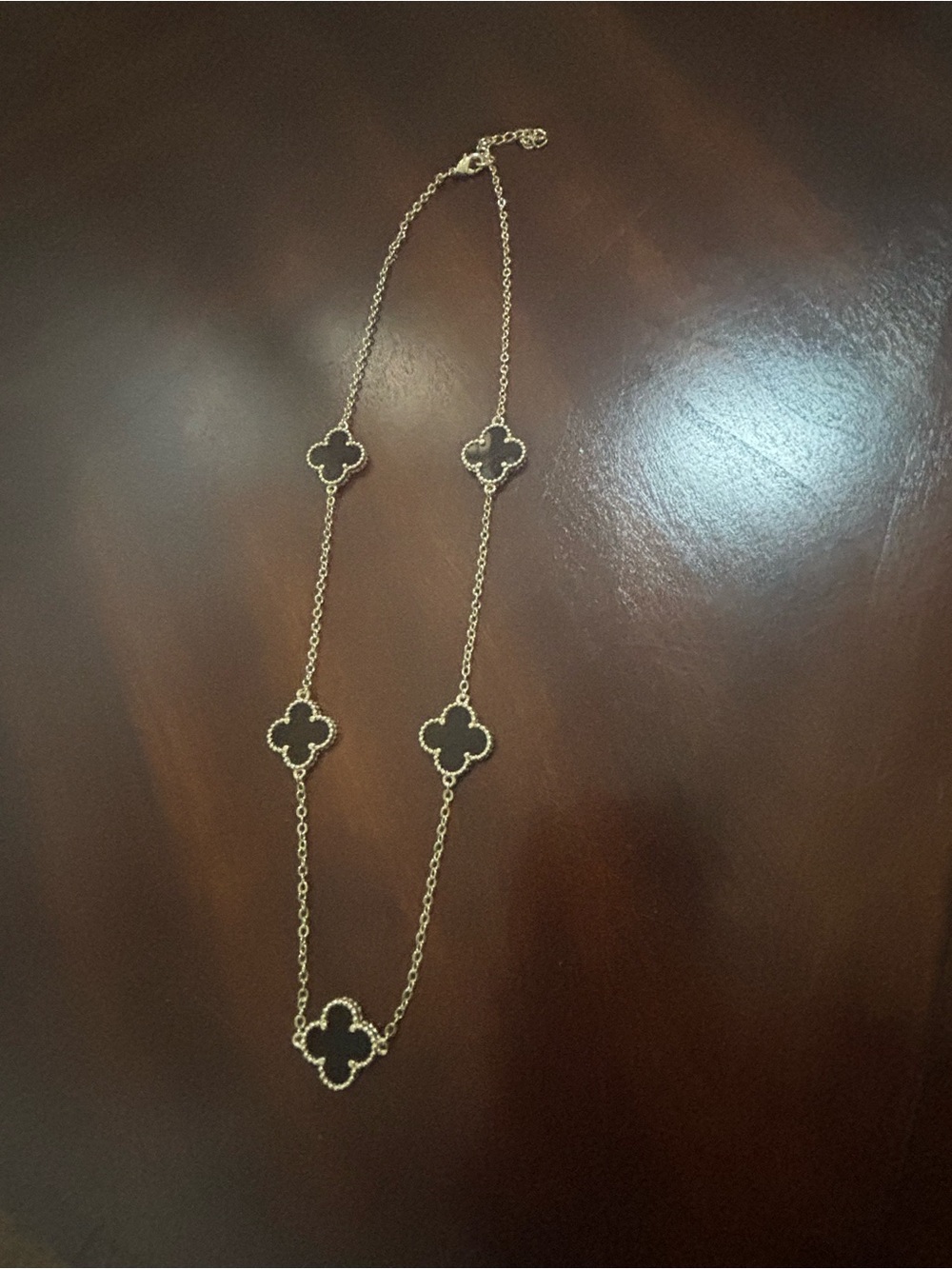 Gold-Tone Clover Necklace with Black Inlay